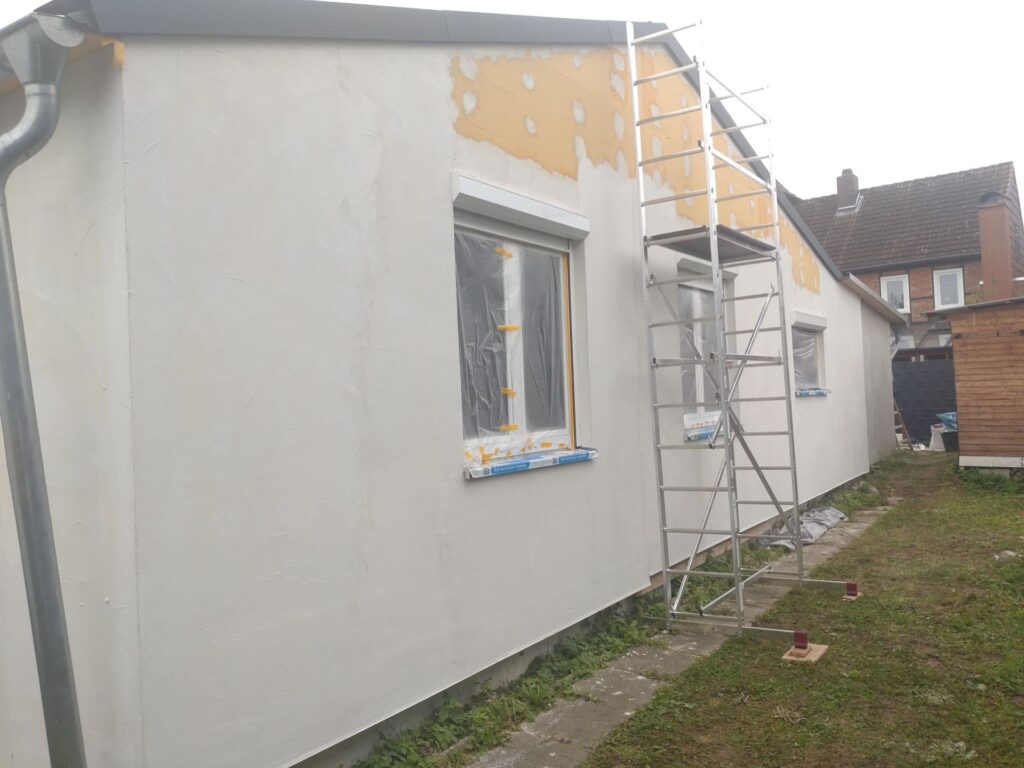 kratzputzfassade holzfaserdaemmung seitenanischt grunideren
